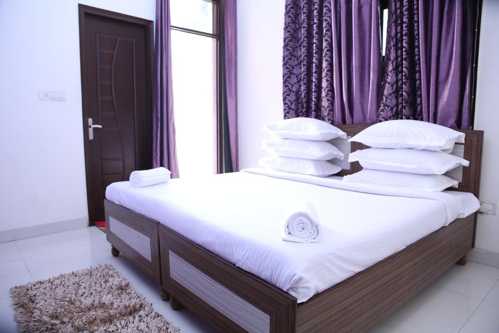 Hotel Airport Land Nueva Delhi Habitación foto